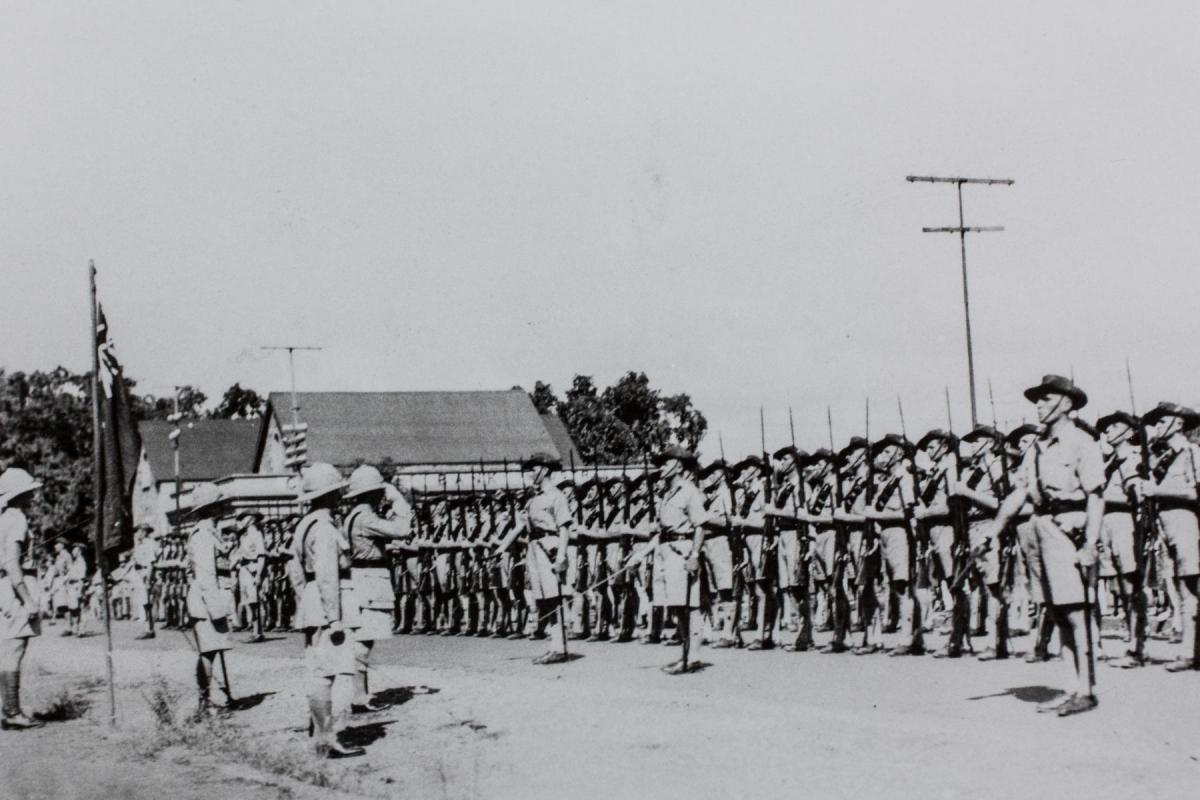 Military display. The mobile force salute the colours at Bennett Street.