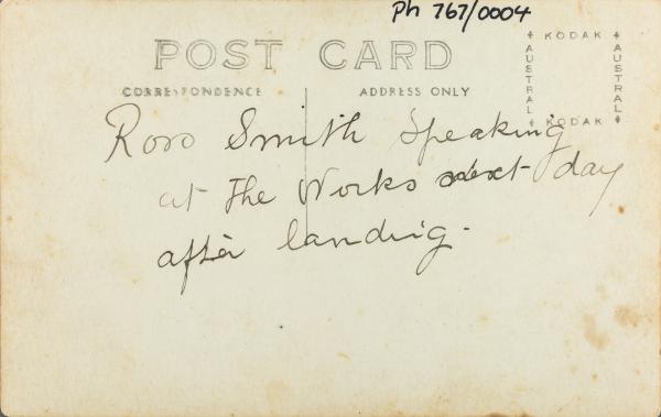Text on reverse: Ross Smith speaking at the Works next day after landing.