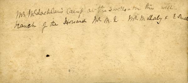 Reverse of stereoscopic photograph of Mr. McLachlan's camp at the three wells, 1869
